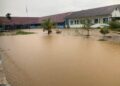 Banjir, SMKN 2 Tanjabtim Tetap Semangat Gelar Upacara HUT Provinsi Jambi ke 68